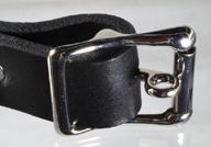 A locking true roller center bar buckle on a strap.